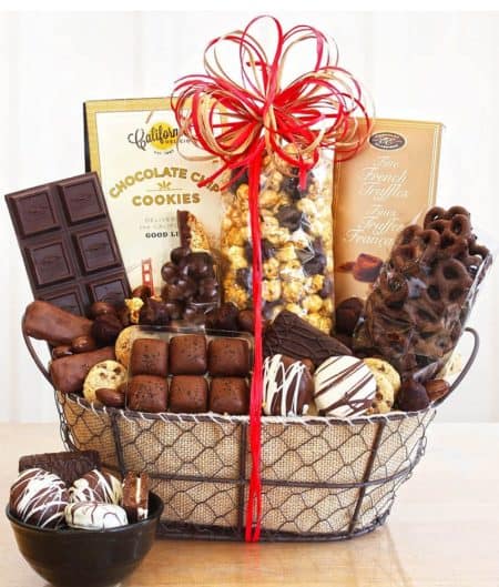 A rustic lined wire basket overflows with a sampling of decadent goodies.