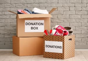 Donation boxes with clothing and shoes